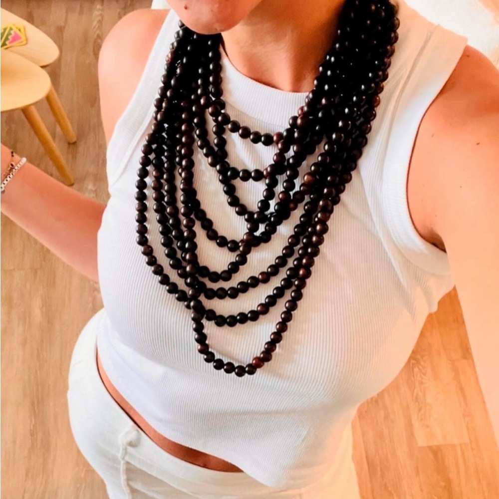 Multi stranded, dark brown cascading beaded necklace. Adjustable, Gold closure